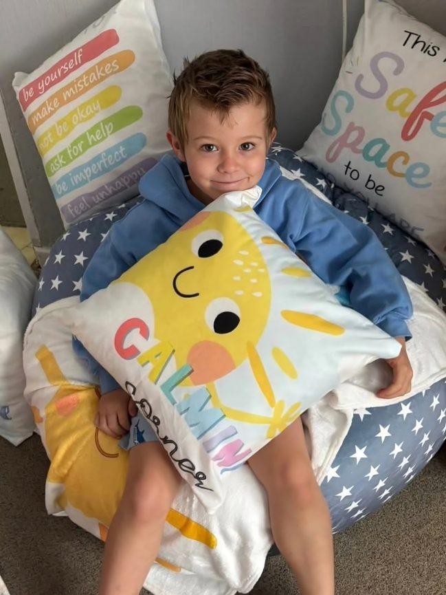 A child relaxing in the calm corner at Toddies